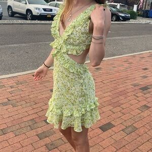 Cute green summer dress with cut outs
